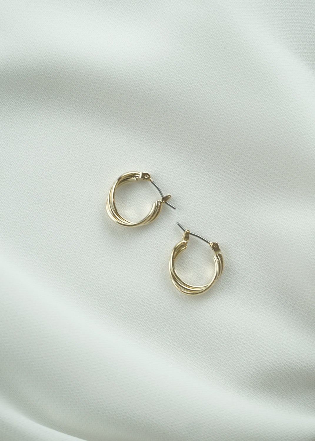 Twisted Golden Tiny Hoop Earrings