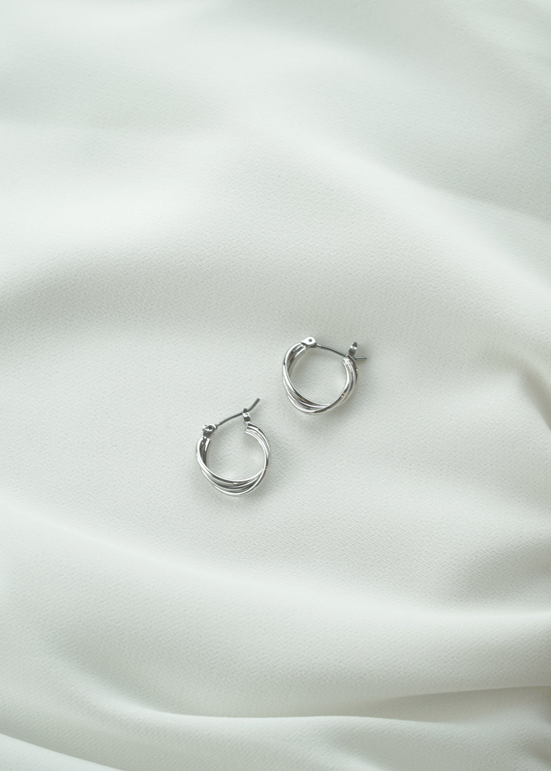 Twisted Silver Tiny Hoop Earrings